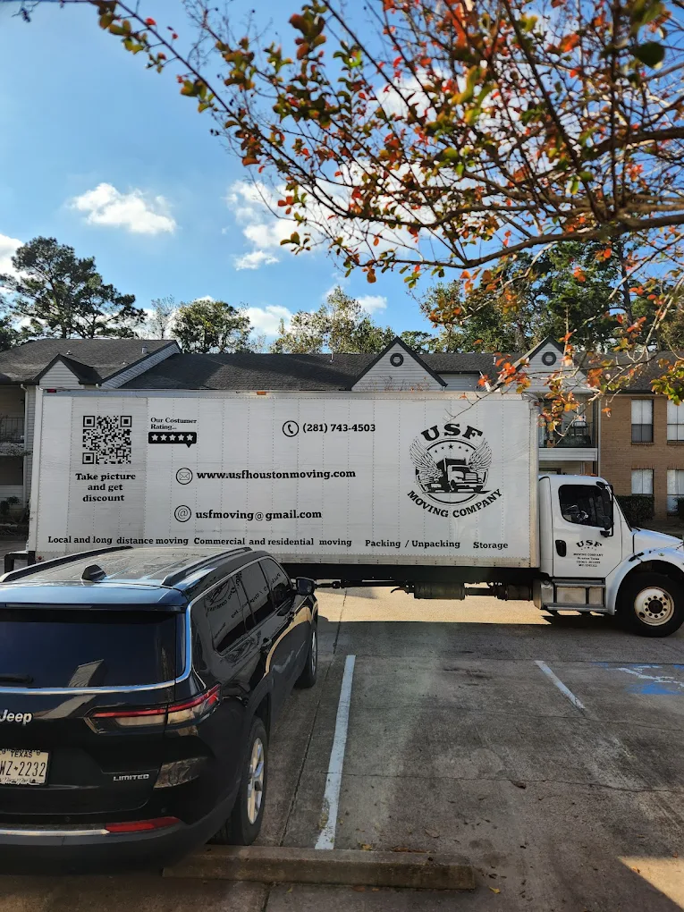 USF Moving Company truck being loaded for a long-distance relocation from Houston, Texas