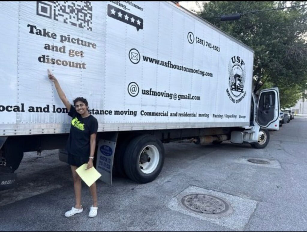 USF Moving Company truck parked in front of a residential home in Sacramento california